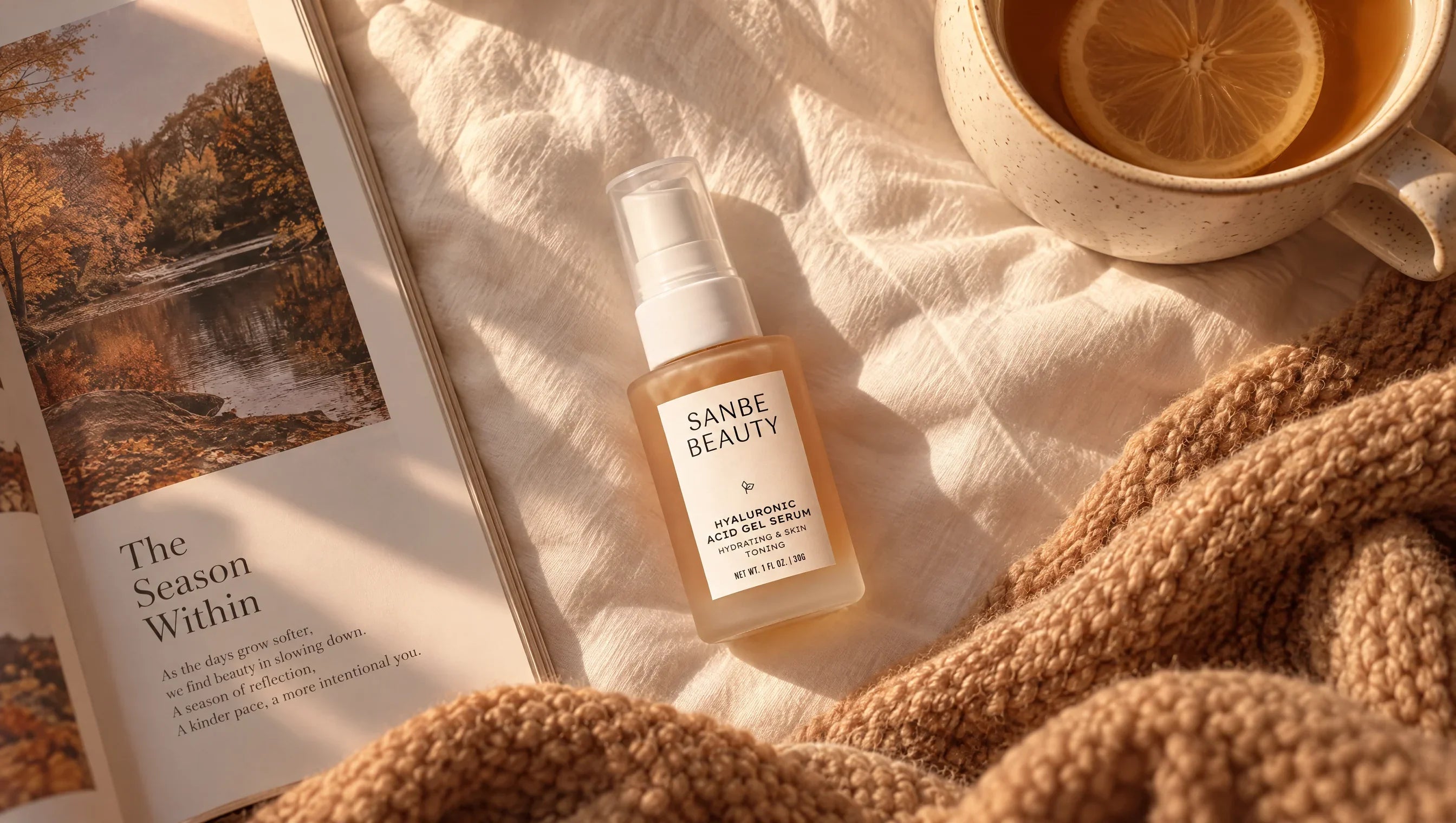 Sanbe Beauty Hyaluronic Acid Gel Serum bottle next to a book and tea.